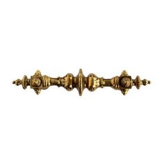 an antique brass door handle on a white background