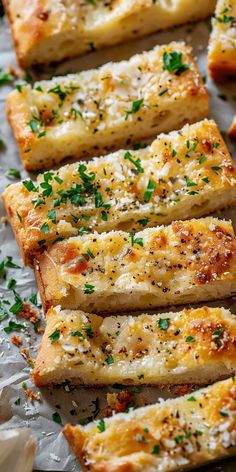 slices of garlic bread with parsley on top