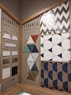 a room with several different types of tiles on the wall