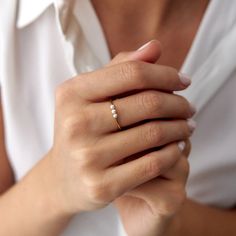 Our lovely minimal 14k solid gold pearl ring. Simple and elegant. 14K solid gold is perfect for everyday wear since it will never tarnish, and you don't have to worry about contact with conditioners or water. A perfect ring to stack as well. ★ Ring Features• Gold Kt: 14K Solid Gold (All rings are stamped for authenticity)• Available Gold Color: Yellow Gold• Man made pearls• Band Width: 1.4 mm Pearl Rings In Gold Simple, Gold Ring Pearl, Everyday Yellow Gold Pearl Open Ring, Elegant Everyday Pearl Open Ring, Minimalist Everyday Pearl Ring With Round Band, Classic Everyday Yellow Gold Pearl Ring, 14k Gold Open Pearl Ring For Everyday, Everyday Yellow Gold Pearl Ring, Minimalist Everyday Yellow Gold Pearl Ring