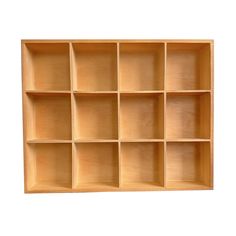 a wooden shelf filled with lots of compartments