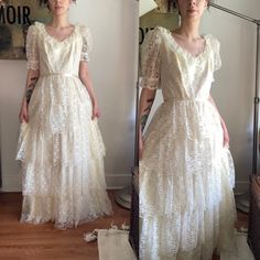 "1960s ruffle lace layer wedding dress In excellent vintage condition. No noticeable stains, but does have that vintage smell.  The dress says size 11, but I gather it's closer to a small/medium today.  Zips at the back.  Comes with petticoat skirt and wires (not pictured) it's a white petticoat and the wires look like they've only been used once.  Measurements are laying flat:  Armpit to armpit:17\" Shoulder to hem: 59\" Waist:14\" Hips: 16\" If you have any questions, please feel free to ask." Victorian Vintage Lace Dress With Ruffles, Vintage Tiered Dress With Lace Trim, Vintage Tiered Lace Trim Dresses, Vintage Victorian Dress With Lace Bodice, Lace Victorian Dress With Ruffles For Vintage Events, Cream Lace Vintage Dress With Ruffles, Cream Vintage Dress With Ruffles For Wedding, Lace Victorian Dress With Ruffles For Wedding, Cream Vintage Wedding Dress With Ruffles