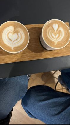 two cups of coffee with hearts on them