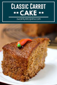 a close up of a piece of cake on a plate with the words classic carrot cake