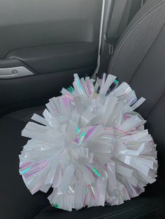 a car seat filled with lots of plastic bags