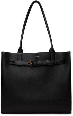 Grained calfskin tote in black. · Twin carry handles · Adjustable tab-slot strap at top · Logo stamp at face · Zip pocket at interior · Microfibre lining · Logo-engraved gold-tone hardware · H11 x W13 x D6.5 Supplier color: Black Tom Ford Bag, Black Toms, Ford Black, Medium Tote, Logo Stamp, Black Tote Bag, Tom Ford, Apparel Accessories, Calf Skin