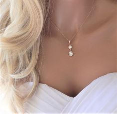 "Bridal Necklace Bridesmaid Jewelry Diamond CZ Silver or Rose Gold Bridesmaid Prom Special Event This very elegant Lariat Back Necklace is perfect for that special occasion. This features sparkly CZs in the front with a matching backdrop.   ✦ Please note: No returns on wedding jewelry IT'S IN THE DETAILS ✦ Rose Gold Filled or Sterling Silver Chain  ✦ Shown at 16\" ✦ CZ charms are plated over jewelers brass ✦ Matching Earrings have stainless steel post 🎁  BRIDESMAIDS GIFTS:  https://www.etsy.com/shop/GildedSapphireStudio?ref=seller-platform-mcnav§ion_id=25100884  WHY YOU'LL LOVE IT * Because handmade = made with love, care, and thought. * Ethically Sourced * Comes beautifully gift boxed * Crafted with care from sunny South Florida. ♡ HAPPINESS GUARANTEE: We stand by our jewelry and want yo Backdrop Necklace, Rose Gold Bridesmaid, Prom Necklaces, Backdrops Necklace, Wedding Diamond, Gold Bridesmaids, Back Necklace, Back Jewelry, Wedding Jewellery