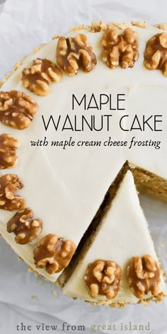 a close up of a cake with walnuts on top and the words maple walnut cake