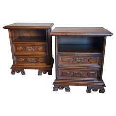 two wooden nightstands sitting next to each other