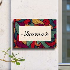 there is a sign on the wall that says shanma's