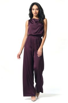 Off-the-shoulder jumpsuit with a halter neck tie. The back features a draped cutout. Wide-leg pants with an elastic waist, highlighted by a broad belt. This elegant piece is perfect for special occasions. Inseam length: 88 cm.   Made of Armani silk, 100% polyester. Bridesmaid Pantsuit, Wedding Planner Outfit, Purple Jumpsuit, Purple Bridesmaids, Silk Jumpsuit, Halter Jumpsuit, Clothing Gifts, Bridesmaid Outfit, Pantalon Large