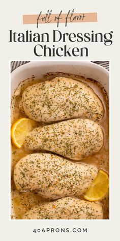 chicken with lemons and herbs in a white casserole dish