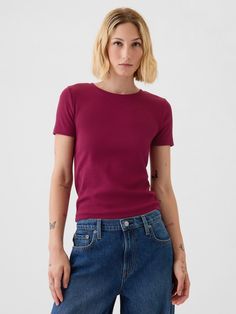 Soft cotton-blend ribbed-knit slightly cropped T-shirt.  Crewneck.  Short sleeves.  Certain styles have allover prints.  * Fit: Stretch-to-Fit.  Slim & stretchy that forms to your shape.  Slightly cropped, hits at the waist.  Models wearing Gap Purple Tee, Fitted Tee, Cropped T Shirt, Royal Purple, Tall Women, Crop Tshirt, Ribbed Fabric, Crew Neck Tee, Workout Tee