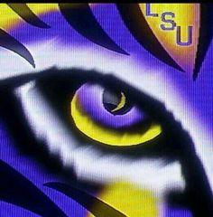 an abstract painting with the words usu in yellow and purple colors, on a screen