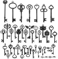 an assortment of antique keys are shown in black and white, with hearts on them