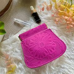 "Welcome to Saly limon USA, where you'll find a beautiful collection of embossed flowers leather pouches, jewelry bags, and small wallets designed to suit all your storage needs. ITEM DESCRIPTION * Labor time: 4 hours * Measurements: 3.5\"x 3.5\" ( 9 x 9 cm)  * Authentic sustainable leather  IDEAS OF WHAT TO STORE IN YOUR LEATHER POUCH Our cable pouches and charger pouches are perfect for organizing your tech accessories while our cute small pouches make great coin purses or jewelry holders. Whe Charger Pouch, Mini Sewing Kit, Travel Pouches, Leather Pouches, Jewelry Holders, Cord Ties, Leather Ideas, Sustainable Leather, Small Notebook