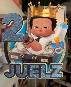 an image of a baby with a crown on it's head and the number two