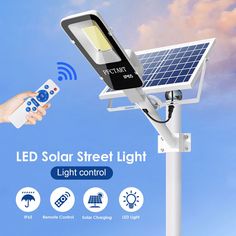 solar street light with remote control and motion activated leds on the side, in front of blue sky