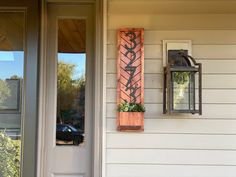 a wooden sign on the side of a house