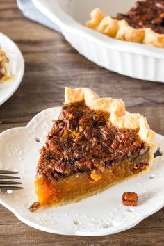 a slice of pecan pie on a white plate