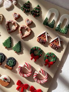 decorated cookies are arranged on a tray with the letters and numbers spelled out in them