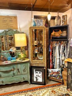 a room filled with lots of different types of furniture and decor on top of carpeted flooring