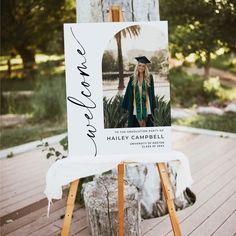 an easel with a graduation photo on it