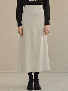 This is a maxi-length skirt that exudes a daily lovely mood. Made with a high-tension fabric, it offers comfortable wear, and its subtle wrinkle texture adds a charming touch. With its maxi length and straight fit, it pairs well with oversized sweatshirts, cardigans, and knits. Adding an obi belt with a logo pendant can enhance the look with a subtle touch. It's recommended for various styles such as daily wear, casual outings, flower outings, and office looks. -It comes in two colors: black and cream.-This is a maxi-length skirt that exudes a daily lovely mood. -Made with a high-tension fabric, it offers comfortable wear, and its subtle wrinkle texture adds a charming touch. Cream Colored Relaxed Fit Lined Maxi Skirt, Cream Cotton Lined Maxi Skirt, Beige Cotton Lined Maxi Skirt, Non-stretch Beige Maxi Skirt For Spring, Cream Maxi Skirt, Relaxed Fit, Lined, Cream Skirt, Obi Belt, Oversized Sweatshirt, Black Cardigan