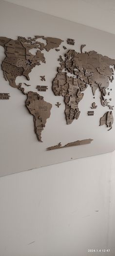 the world map is made out of cardboard