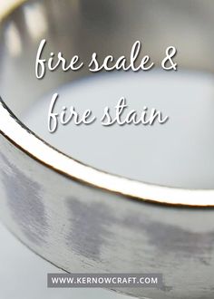 a close up of a ring with the words fire scale and fire stain