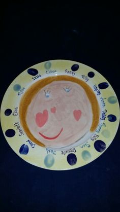 a plate with a face painted on it