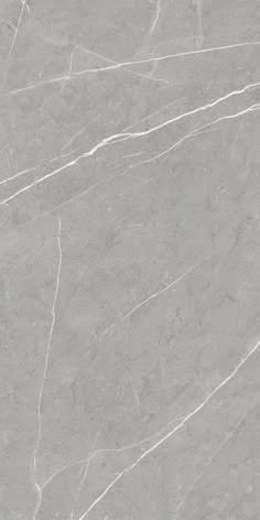 a gray marble textured surface with white lines