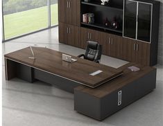 an office desk in the middle of a room