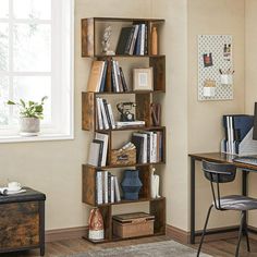 a room with a desk, chair and bookshelf filled with various types of books