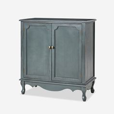 an old blue cabinet with two doors and handles on the bottom, against a white background