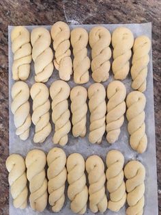 the doughnuts are lined up and ready to be baked