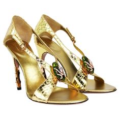 New Tom Ford for Gucci Gold Snake Sandals. S/S 2004 Collection Designer size 9.5 B ( Italian 39.5 ) Malachite Green color jeweled snake head. The heel features two inches of rose gold toned bamboo. Heel height - 4.5 inches. Made in Italy New with dust bag. Gold Sandals Heels, Tom Ford For Gucci, Gold High Heel Sandals, Tom Ford Gucci, Green High Heels, Snake Heels, Carolyn Murphy, Malachite Green, Gucci Sandals