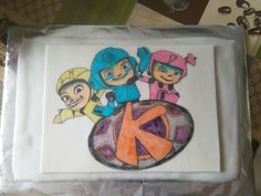 a cake with some cartoon characters on it