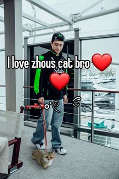 a man standing next to a cat on top of a skateboard with the caption i love zhous cat bro