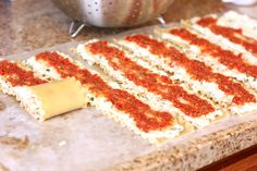 the pinterest app on iphone shows an image of a cake with red and white icing