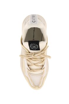 Eclypse sneakers byStella McCartney characterized by the sock-style upper in technical fabric with eco-suede details and trekking laces closure. Rear ribbon loop tab with contrasting jacquard logo, fabric logo label on the tongue, fabric lining and removable insole, rubber sole with debossed logo on the back. Spare laces included. Stella Mc, Fabric Logo, Modern Clothing, Sneaker Games, Logo Label, British Fashion, Fashion Socks, Roberto Cavalli, Small Leather Goods