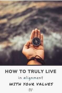 a hand holding a compass with the words how to truly live in alignment with your values iv