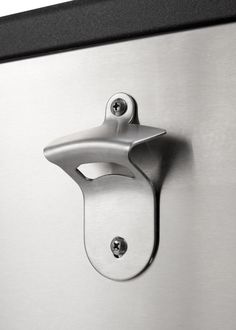 a stainless steel refrigerator door with a handle on it's left side and an opening to the right