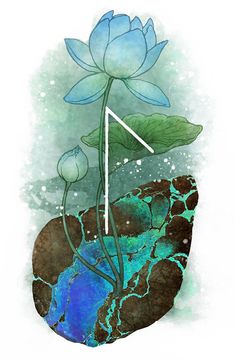 a blue flower sitting on top of a rock