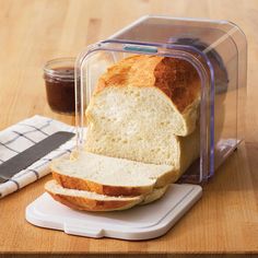 a loaf of bread sitting on top of a cutting board