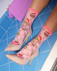 Satisfy your sweet tooth with our retro '50s-inspired pink sheer sock, featuring decadent cakes, ice cream cones, milkshakes, and candy swirls. We elevated the design with pink checkers reminiscent of a retro dinner, and added a pop of color with a turquoise heel. Perfect for pairing with heeled sandals and pointy pumps for a head-to-toe girly look. This item is final sale. One Size. Recommended fit US W5.5-10. 200 Needle Count. ✨ Funky yet elegant - no silly or childish patterns 🧦 Premium qual Sock Candy, Girly Socks, Retro Dinner, Cakes Ice Cream, Turquoise Heels, Socks Collection, Pointy Pumps, Retro Sweets, Felt Cowboy Hats