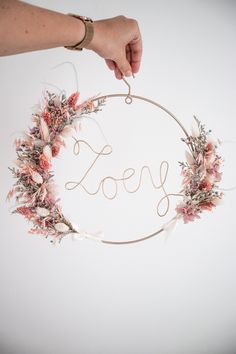 A dried flower wreath is such a natural, organic and really long-lasting decoration for a nursery! As dried flowers are so popular nowadays it might be a perfect gift for newborn, baby or baby-shower party. You can custom your wreath adding any word, name or message. Available in 2 sizes: Small 30 cm and Medium 40 cm at the widest point with the flowers (please check the options). *Dried flowers are quite delicate. Some shedding during shipping and while handling is possible. *To preserve the co Name Wreath, Lavender Wedding Bouquet, Gift For Newborn Baby, Diy Fleur, Dried Flower Wreath, Dried Flower Wreaths, Gift For Newborn, Wild Grass, Flower Nursery