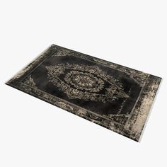 a black and beige area rug with an intricate design on the center, in front of a white background