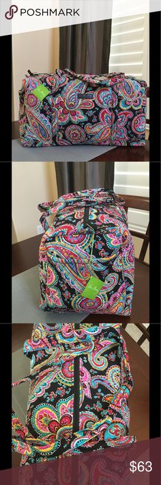 NWT VERA BRADLEY LARGE DUFFEL Brand new with tags Vera Bradley large duffel Parisian paisley pattern 15" strap drop Handy outside end pocket Folds flat for easy storing Dimensions 22" W x 11½" H x 11½" D - 15" strap drop Duffle Smoke/pet free home Vera Bradley Bags Travel Bags Small Bags, Travel Bags, Paisley