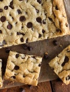 chocolate chip cookie bars cut into squares on a cutting board